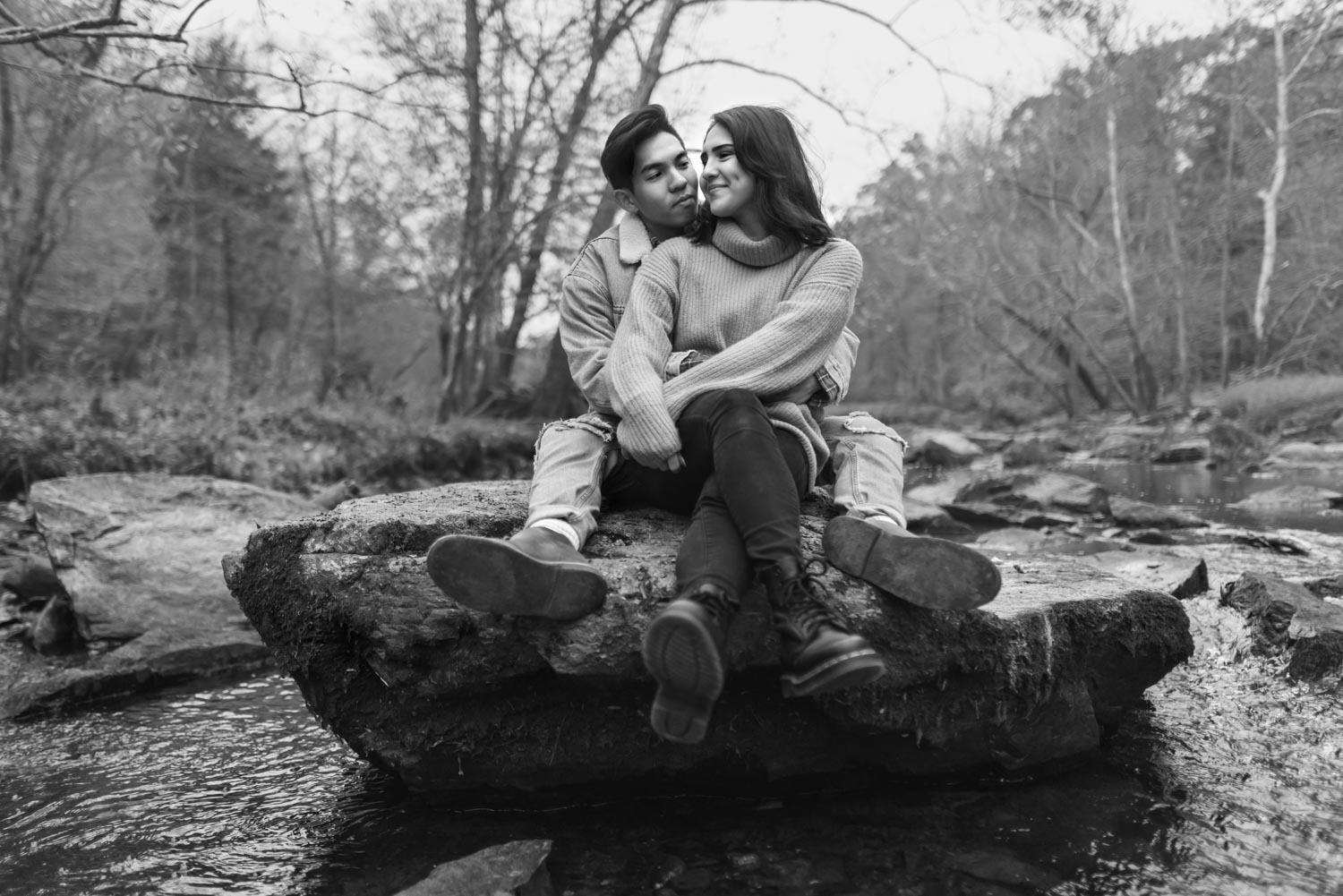 Couple Sitting On the Rock in Eno River